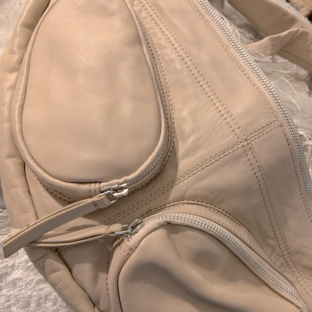 Free People Fanny pack in cream.